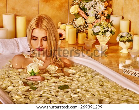 Woman relaxing at water spa.