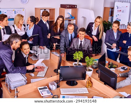 Happy group business people in office.