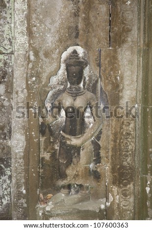 siem reap cambodia temples Hindu Hindii stone temples complex. Stone carved relef. Known as a the lost temples abandoned around the fourteenth century from a once thriving nation and culture.