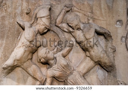 soldiers about to slaughter helpless women (carving from the acropolis in london museum)