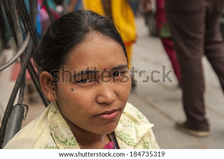 KATHMANDU, NEPAL - CIRCA OCTOBER 2013: typical Nepalese beauty of local women circa October 2013 in Kathmandu.