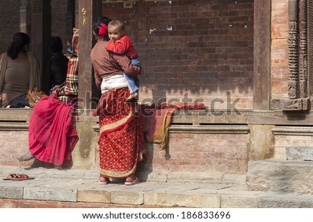 KATHMANDU, NEPAL - CIRCA NOVEMBER 2013: Nepalese mother with child circa November 2013 in Kathmandu.