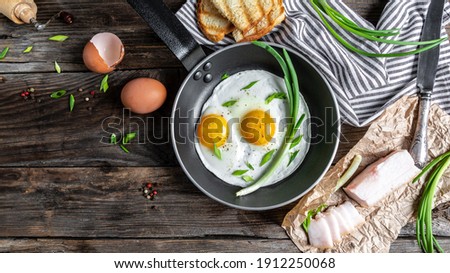 Similar – Image, Stock Photo Fried eggs with green asparagus. Fast lunch ideas, healthy breakfast, summer food.