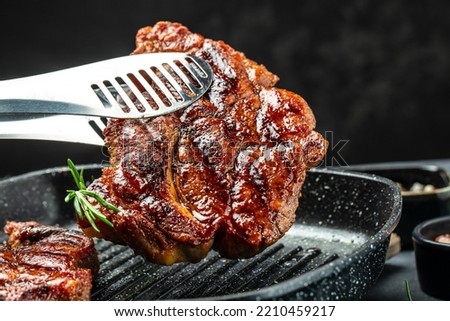 Similar – Image, Stock Photo Grill pan with rosemary and garlic in kitchen