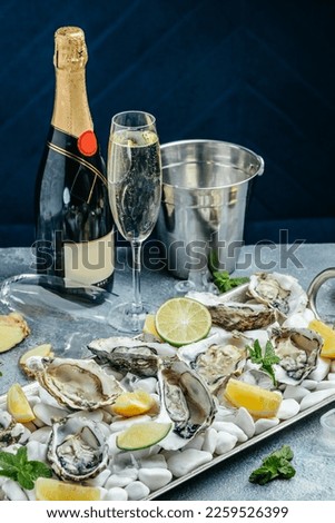 Similar – Image, Stock Photo Fresh oysters with lemons in restaurant