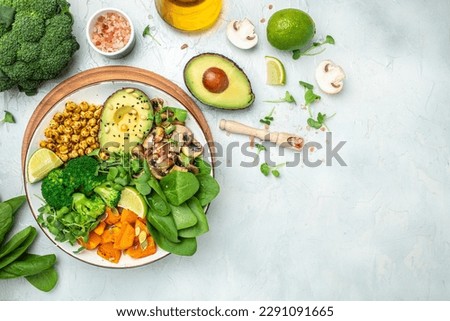 Image, Stock Photo Healthy vegetarian lunch ingredients. Tortilla wraps with fresh vegetables, avocado , olives oil and lemon on rustic wooden kitchen table , top view. Cooking preparation. Vegan food.