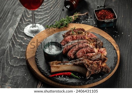 Similar – Foto Bild Kalbfleisch-Rib-Eye mit Gemüse und Soßensoße.