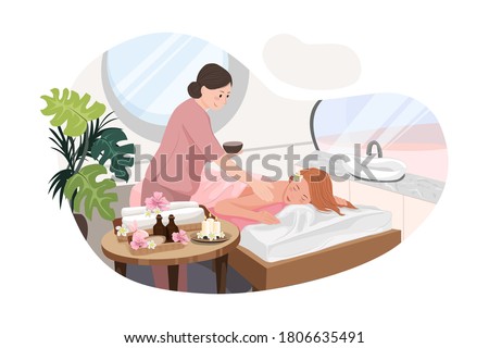 Relaxed woman getting back massage in luxury spa with professional massage therapist. Wellness, healing and relaxation concept.