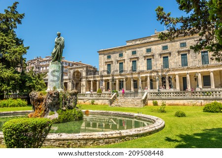 CORFU, GREECE - AUGUST 2,2014 - Lord Frederic Adams statue with Asian arts museum in Corfu town.Museum is in palace of St. Michael and St. George.