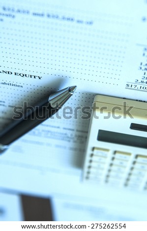 Financial Statement ,pen and calculator on Business concept
