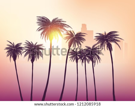 Los Angeles skyline with palm trees in the foreground