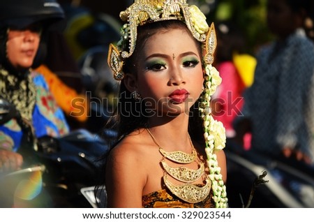 JEPARA, JAVA, INDONESIA - AUGUST 15, 2015: Traditional kids carnival on the Independence Day of Indonesia in Jepara, Java, Indonesia on August 15, 2015.