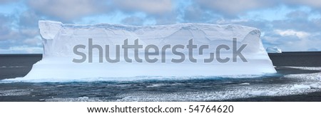 Antarctic ice island with penguins  in atlantic ocean