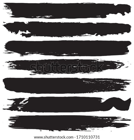 Collection of vector grunge brushes. Paint strokes with a dry brush. Abstract ink blots on a white background