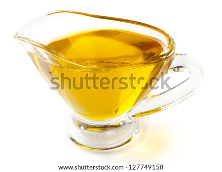 Olive oil in gravy boat, isolated  on white background
