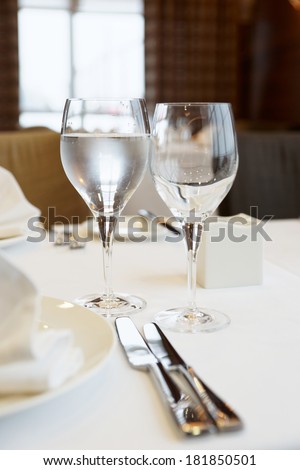 Table arrangement in an expensive haute cuisine restaurant