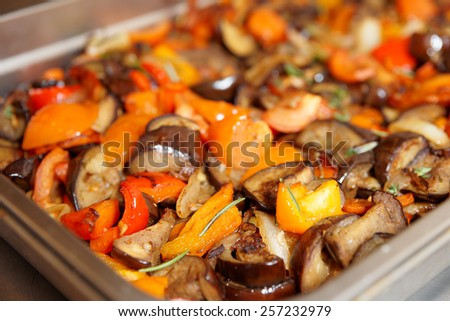 Vegetable ragout in steel container at commercial kitchen