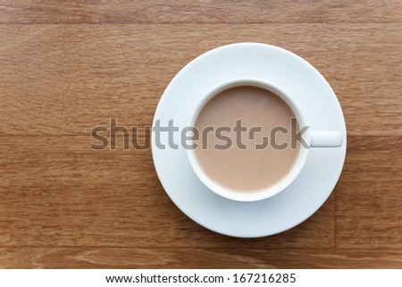 Top view cup of chocolate on wooden table