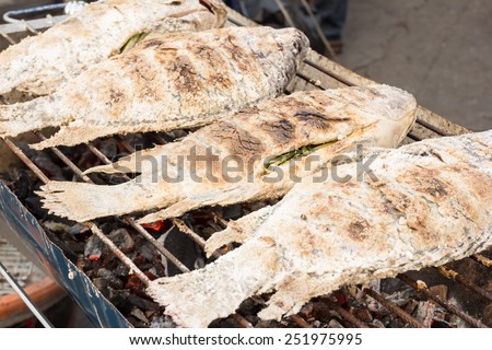 Grilled white snapper fish coated rock salt - Thai food
