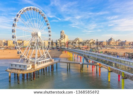 Similar – Image, Stock Photo Scheveningen beach in the evening with a view of the lighthouse and Ferris wheel