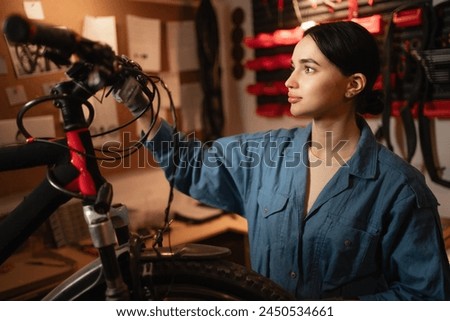 Similar – Image, Stock Photo Focused craftsman repairing handlebar with fire