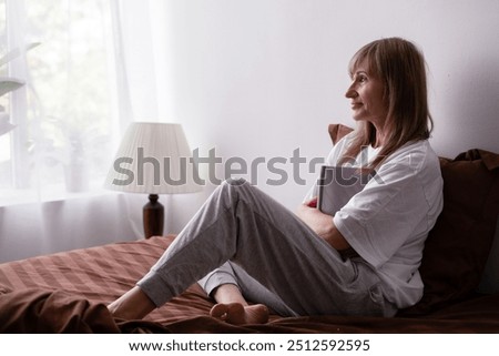 Similar – Image, Stock Photo Senior absorbed in thought