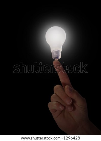 Light bulb ,conceptual for idea  at fingertip.Plenty of space for text in background or bulb.