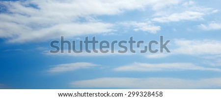 Sky panorama for web sites and design. Blue sky and white clouds, soft image.