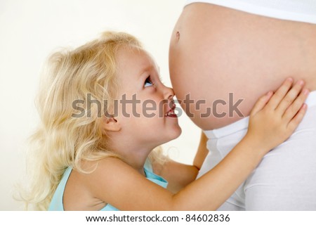 Similar – Image, Stock Photo A young mother teaches her little daughter to draw with colored pencils. Time together, creativity, education. Side view