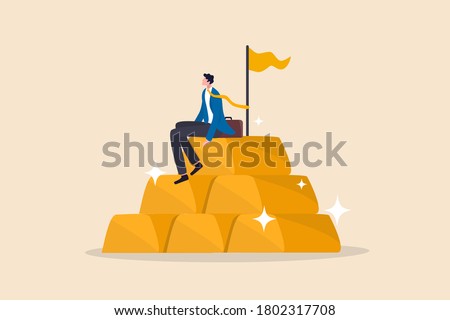 Gold investment, safe haven in financial crisis or wealth management and asset allocation concept, businessman success wealth manager, trader or rich investor sitting on stack of gold bar bullion.