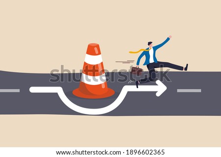 Overcome business obstacle, blocker, effort to break through road block, solution to solve business problem concept, smart bravery businessman run the way around and jump pass traffic pylon roadblock.
