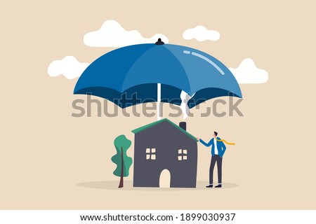 House insurance, home disaster insure coverage or safety or shield for residential building concept, young man house owner with his house under strong cover umbrella.