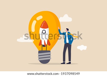 Entrepreneurship, setting up new business, motivation to create new business idea and make it success concept, businessman start up company owner standing with innovative rocket inside lightbulb idea.