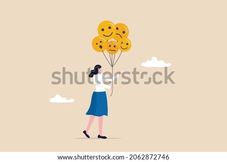 Emotional control and self regulation, stressed management or mental health awareness, feeling and expression concept, calm woman holding balloons with emotion or expression faces, happy, sad or fear.