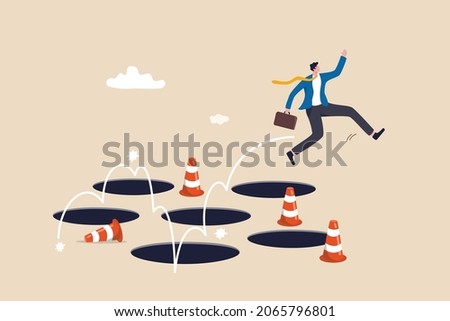 Avoid pitfall, adversity and brave to jump pass mistake or business failure, skill and creativity to solve problem concept, smart businessman jump pass many pitfalls to achieve business success.