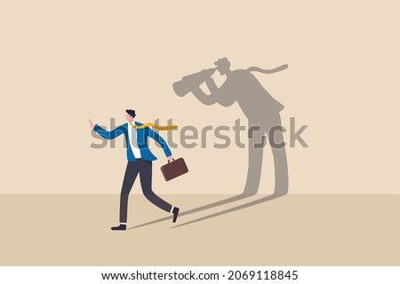 Internet stalker, espionage, online advertising tracking and follow users, spyware, safety, security and privacy issue concept, businessman walking with shadow using spyglass binocular stalking him.