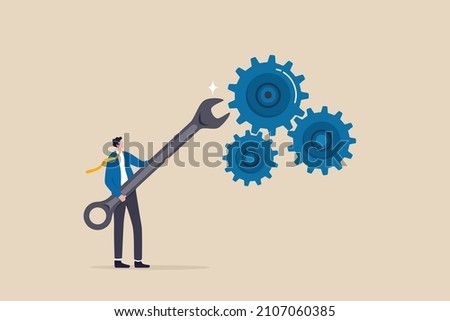 Adjustment and optimization for business improvement, change or fine tune for smooth ride, repair and maintenance service concept, businessman holding wrench to adjust gear cogwheels setting. Photo stock © 