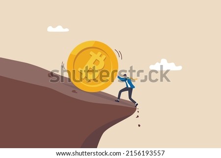 Pushing Bitcoin prevent from price falling down, cryptocurrency risk, fluctuation or volatility, crypto crisis or panic sales concept, businessman investor push Bitcoin from falling down the cliff.