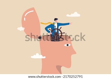 Self control or leadership thinking for business decision or guidance to the right direction, motivation, mindset or consciousness concept, businessman leader control steering wheel helm on his head. Foto stock © 