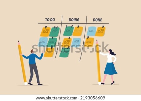 Review work progress on kanban board, todo list, in progress task and finished one, project management or planning for production concept, business people review project progress on kanban board.