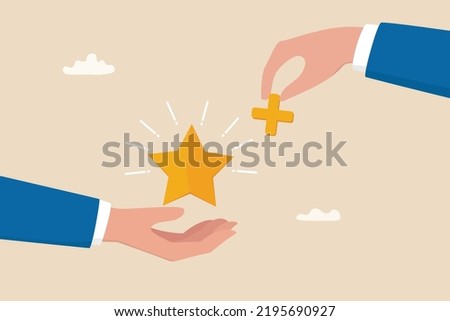 Value added, increase value or price of product to make profit, additional advantage or development for more benefit concept, businessman hand holding star value and another added plus sign to it.