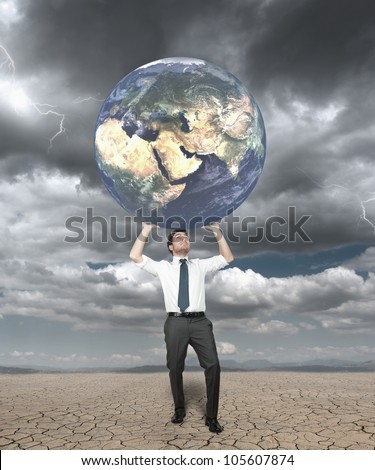 Businessman protects the world from the storm