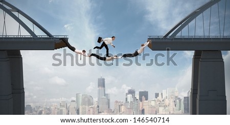 Teamwork concept with running businessman over the bridge