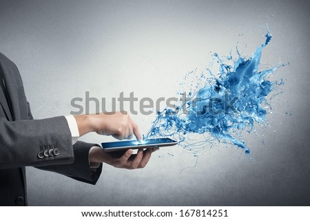 Concept of creative technology with businessman and tablet