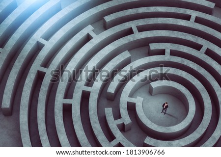 Confused businessman thinks how to find the right way to exit from a big maze