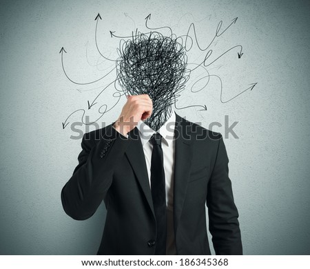 Confused businessman with arrows and lines in head