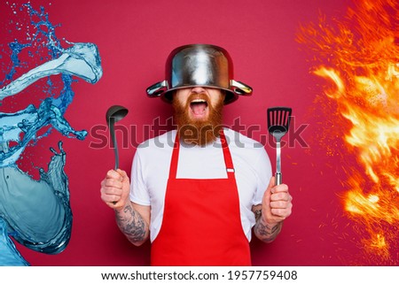Man chef is ready to fight in the kitchen. burgundies background Stock fotó © 