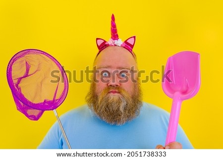 Similar – Image, Stock Photo Pensive man with paddle board before surfing