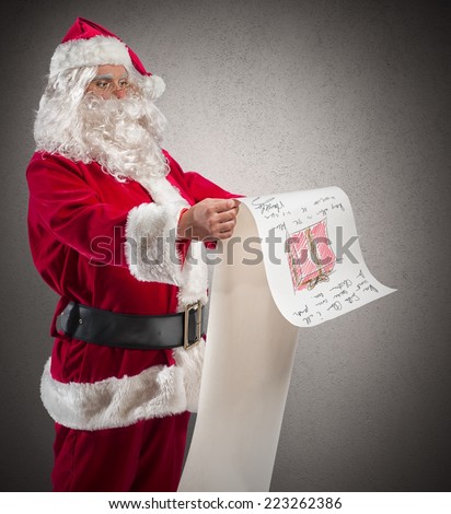 Santa Claus with a big gifts list