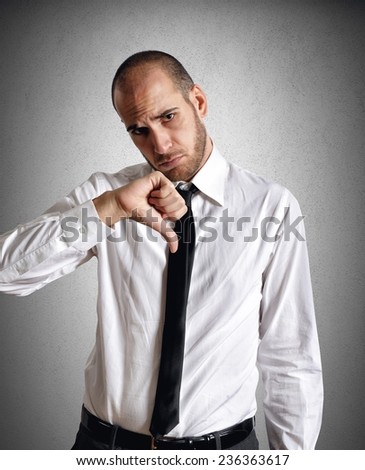 A businessman at work sad and discouraged